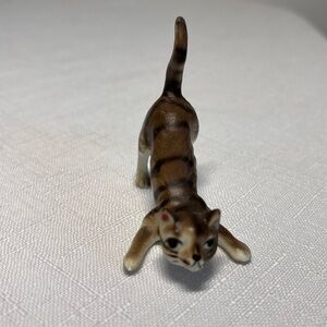 vintage porcelain tabby cat figurine
miniature. Collectible. Stretching!